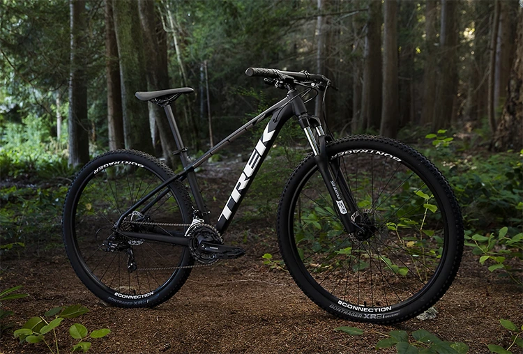 trek marlin 5 mountain bike in a forest