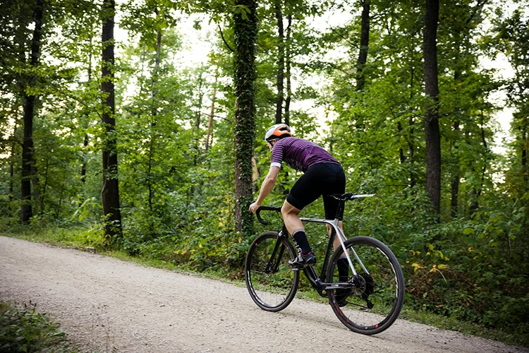 man riding a gravel bike