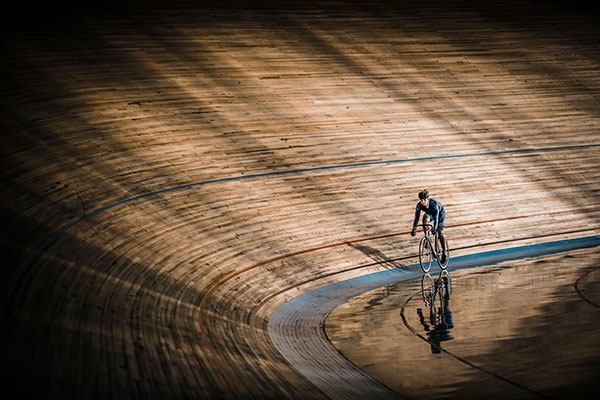 Cyclist on a velodrome