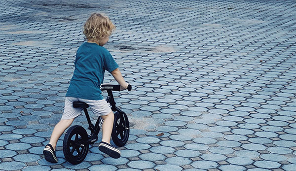 Teaching a kid to ride a bike doesn't have to be a difficult process
