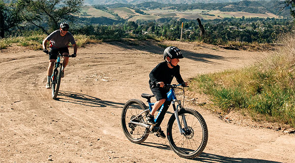 Electric bikes help kids to keep up with their parents