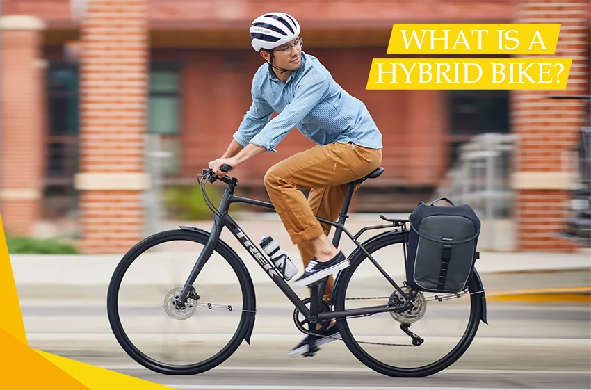 man riding a hybrid bike with a panier on the rear rack