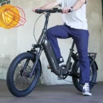 man sitting on a gray ride1up portola bike