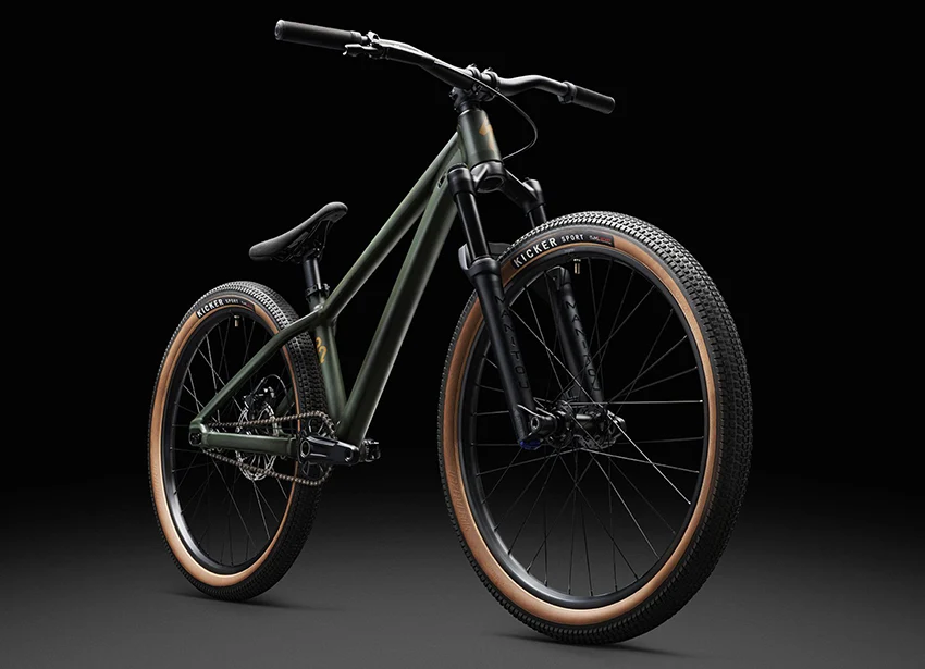 a frontal view of a green specialized dirt jumper wheelie bike