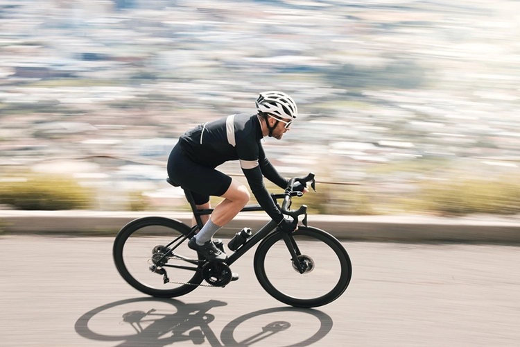 cyclist riding a road bike made by a best bike brand