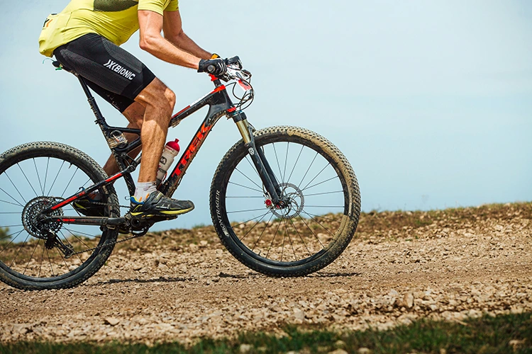 man riding a trek cheap mountain bike