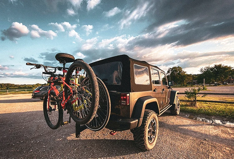 two bikes on a bike car rack on a jeep