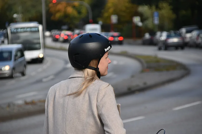 young girl wearing a black helmet