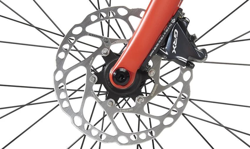 closeup of hydraulic disc brakes on a gravel bike