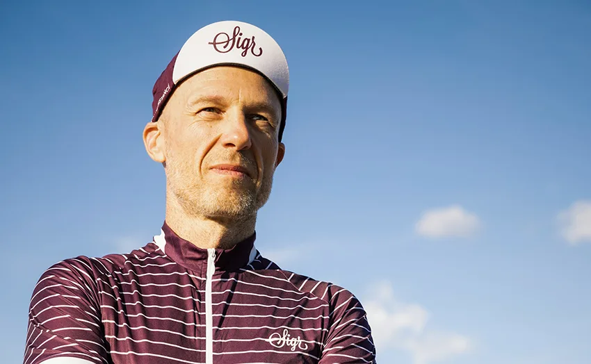 male cyclist wearing a cycling cap