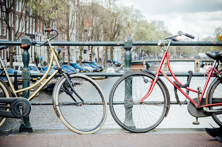 two dutch bikes on bridge