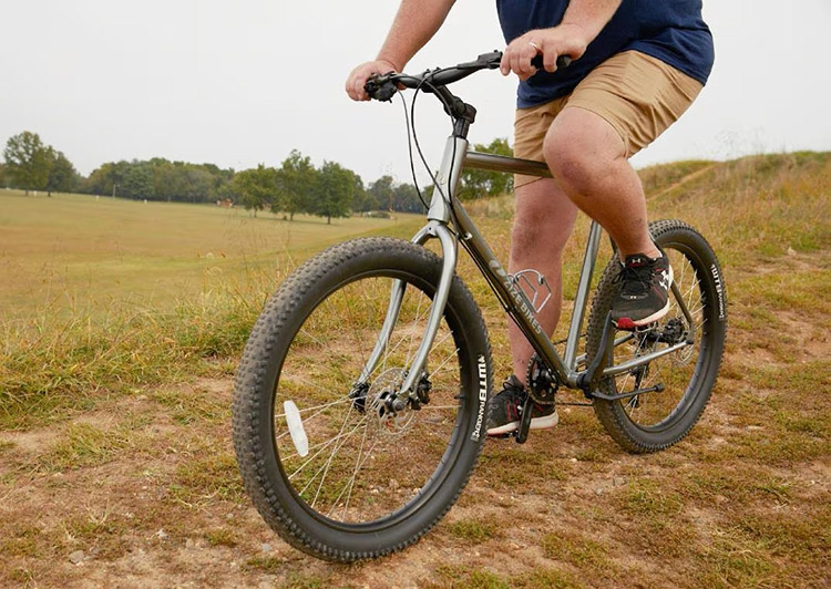 overweight man riding a zize bike