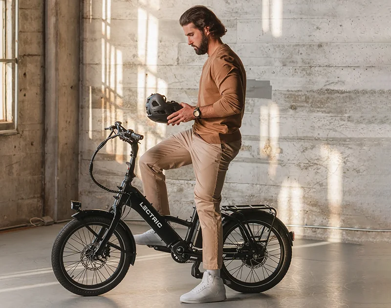 man sitting on a lectric one electric bicycle