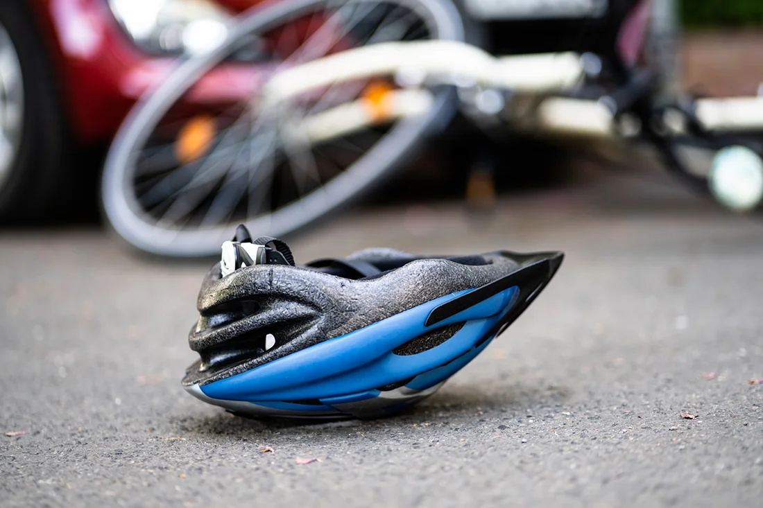 helmet on the road after a bike crash